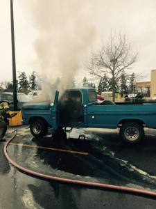 The Sequim Fire Department putting out the fire that started under the hood of our classic 1972 Ford F-250. No one was hurt and the fire was put out safely!